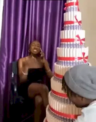 Doyin gushes as she receives huge money cake from Beauty (Video)