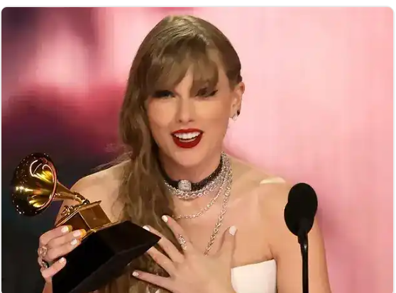 Taylor Swift wins record fourth best album Grammy at star-studded gala
